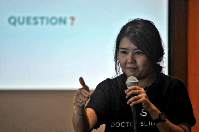 woman speaking at event